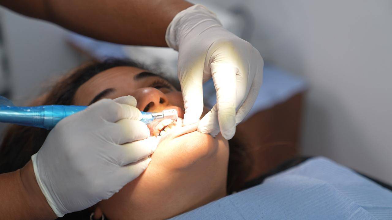 Patient receiving dental treatment in operating room at Elite Smile Clinics New Cairo